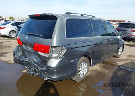 2010 Honda Odyssey Ex-L z USA, uszkodzony, nr VIN 5FNRL3H73AB057149